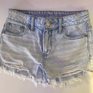 Light wash jean shorts.
